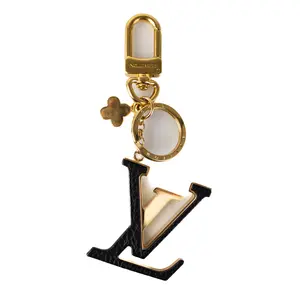 Pre-owned Louis Vuitton Gold Bag Accessories Initial Charm L26021757