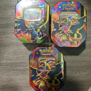 Charzard x and y ex tins