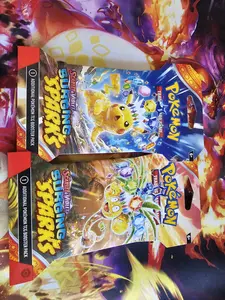 Surging Sparks Sleeved Blister Pack Of 2 Pikachu And Alolan Exeggutor