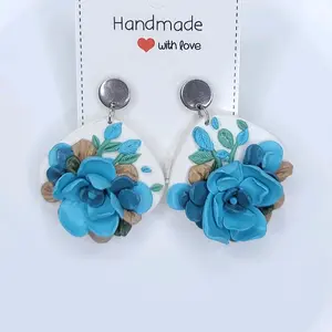 Handmade Polymer Clay Earrings Dangle with Detailed Blue Flower Design Hypoallergenic Lightweight and suitable for Any Occasion