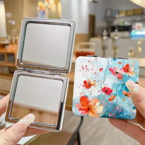 Compact floral design double-sided folding mirror - portable travel makeup mirror, perfect for women and girls. This pocket mirror is perfect for daily beauty use and is also an excellent gift for occasions such as birthdays.