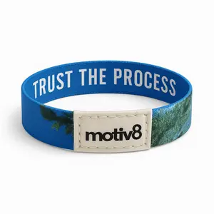 Motiv8 Trust The Process Blue Wristband with Motiv8 Logo and Green Leaf Design