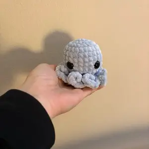 Hand crocheted pale blue octo
