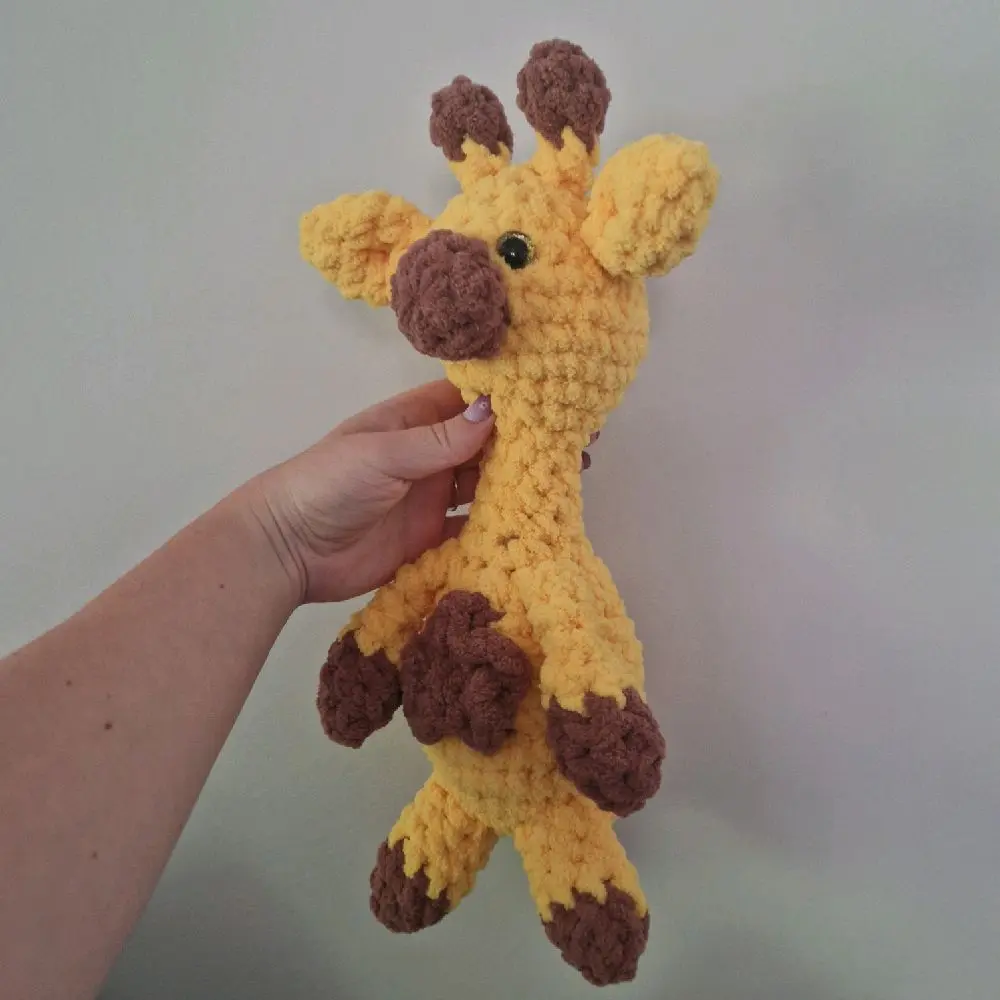 Yellow and brown handmade plushie giraffe crochet amigurumi