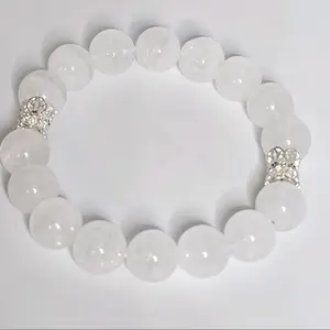 Natural White Calcite Island Spar 10mm Length is approximately 7 inches stretch bracelet