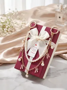 Gift box packaging; 14-inch bag charm; pearl pendant accessory strap with bow charm; bag accessories; handbag accessories; detachable bag chain shoulder strap; suitable for women’s handbags, tote bags, crossbody bags, and clutch bags.