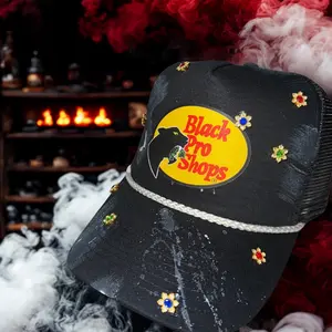 Custom Black Pro Shops Trucker Hat with Embellished Design and Distinctive Logo