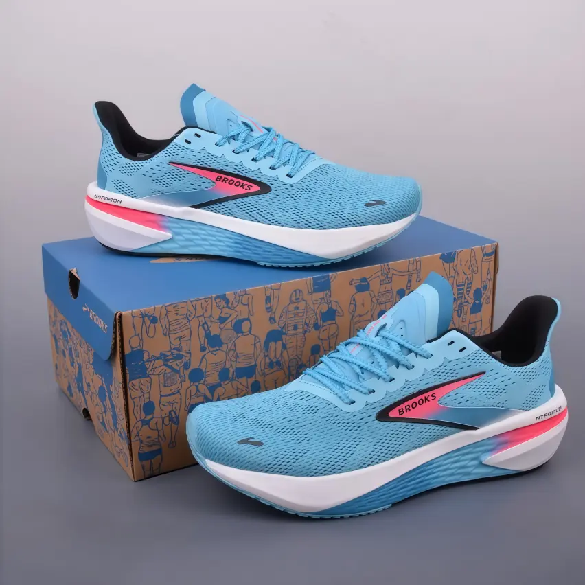 Running sneakers built with premium breathable engineered mesh upper, bright sky‑blue knit with vivid pink accents delivers responsive cushioning for road runs and eye‑catching trendy daily sport outfits