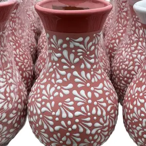 Floreros , Artesanales  / follower bases