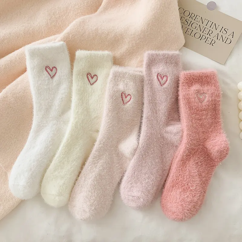 Set of 5 pairs of soft, plush mid-calf socks for couples featuring heart patterns; thick, warm socks for lounging and sleeping during autumn and winter—soft, fluffy, and comfortable.