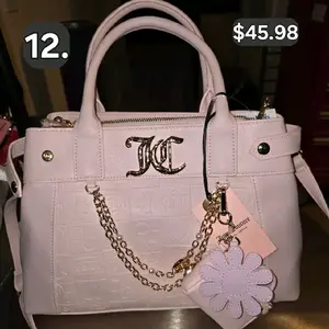 Juicy Couture's Brand Pink Embossed Tote Bag with Chain Strap and Flower Charm for Makeup and Cosmetic Use