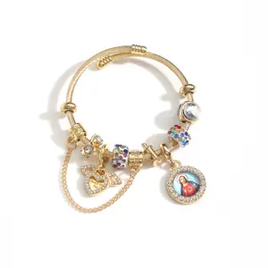 "Faith, Gold, and Jesus" Themed Bracelet — A stylish chain bracelet featuring a central, circular pendant of the Sacred Heart of Jesus; it is the perfect accessory for daily prayer, church services, wedding celebrations, and anniversaries.