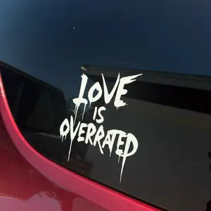 Love Is Overrated Vinyl Decal Sticker with Wings Design for Personal Use