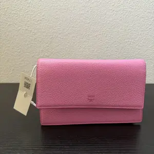 Pre-owned MCM cow Clutches & Wristlets mcm