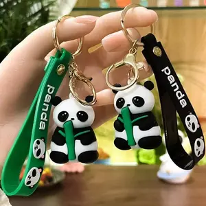 Cute panda keychain holding bamboo, giant panda bag plush toy, cartoon pendant, small gift for vending machines