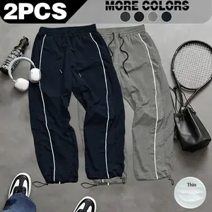 Men's lightweight, breathable, reflective printed wide-leg pants with adjustable leg openings and drawstrings, elastic waist, casual pants suitable for outdoor sports, fitness, campus commuting, street fashion, and versatile long pants