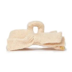 IVORY CABLE KNIT BOW CLAW CLIP