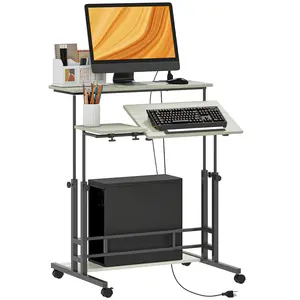 HOMCOM Height Adjustable Standing Desk with Power Outlets, Stand Up Desk with Tiltable Tabletop, Lockable Wheels, Bottom Shelf, Rolling Workstation for Home Office