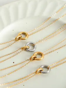 A fashionable gold interlocking double layered necklace, with a simple double ring pendant to create a high-end texture, suitable for various daily commuting, dating and other scenes, it is a versatile and elegant light jewelry item.