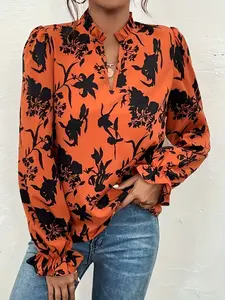 One orange floral-print V-neck long-sleeved shirt with wide sleeves, suitable for both work and vacation.