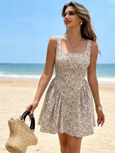 A women's square-neck, Sleeveless floral waist-cinching camisole mini dress, made of lightweight, drapey fabric. The small floral pattern exudes a romantic vibe, making it perfect for casual and romantic summer occasions like picnics, park strolls