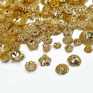 100 vintage flower-shaped beads and floral spacers in assorted shapes and sizes, perfect for crafting delicate bracelets, necklaces, keychain accessories and decorations.