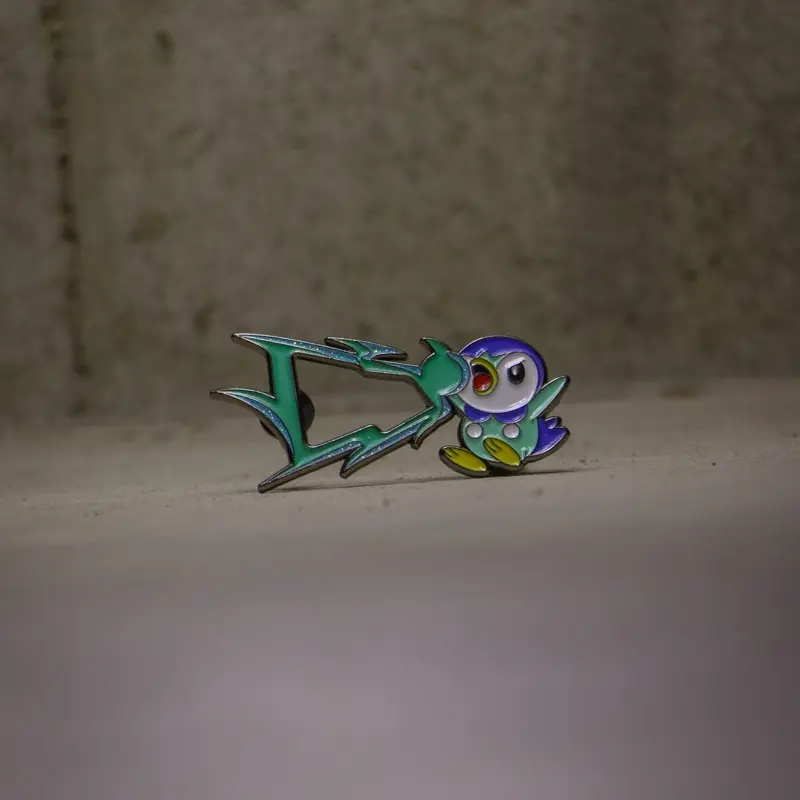Piplup Fitted Pin - Green and Purple Design as Show in the Image