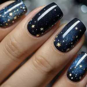 Show Off Your Beauty with This 24pcs Set of Stylish Blue Night Sky Themed Press-On Nails, Featuring a Glossy Finish. Perfect for Women And, This Removable Nail Kit Comes with Jelly Glue And a File.