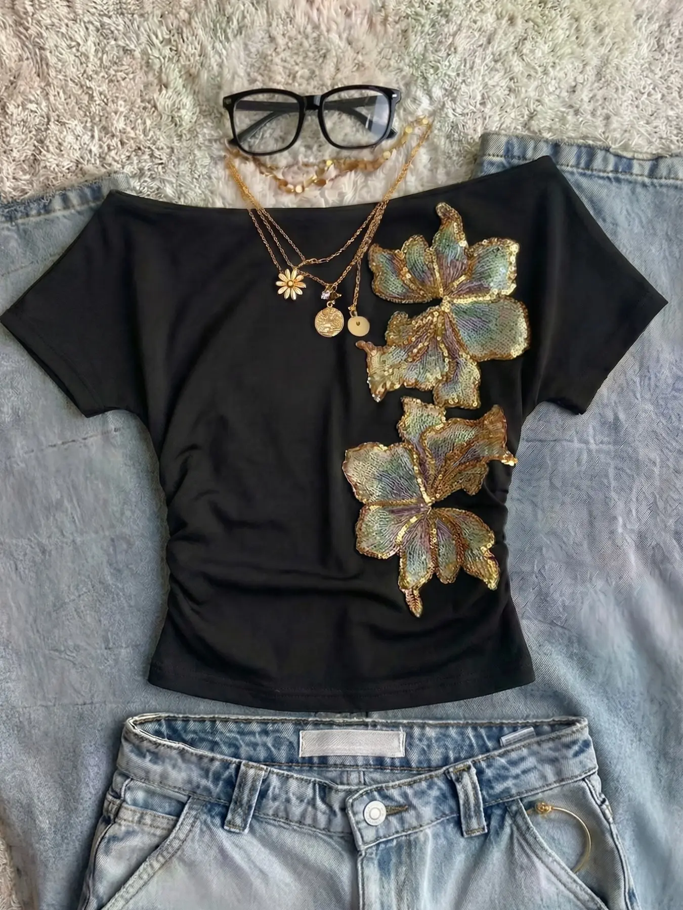 Black Off-Shoulder Short-Sleeve Top with Sequin Floral Flower Embroidery, Slim-Fit Ruched-Waist Casual Trendy Tee for Women, Retro Y2K Edgy Aesthetic, Soft Stretchy Fabric, Statement Sparkly Design for Everyday Nights Out and Casual Fitted Streetwear