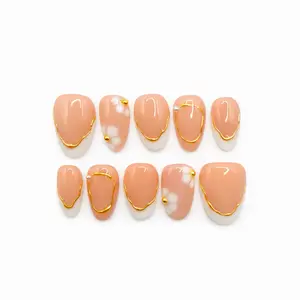 Press On Nails Prette Nail Studio Apricot Gild , Short Almond, Peach Nude Base, Cream French Tips, Gold Outline Detail, Floral Accent, Glossy Finish