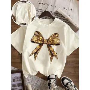 Womens Short Sleeve Crewneck Tee White Rhinestone Gold Bow Graphic Cute Glam Top for Summer Outfit Streetwear Jeans Sneakers Concert Vacation Brunch