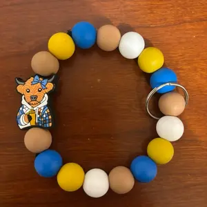 Highland Cow Keychain - Colorful Bead Bracelet with Cow Illustration and Decorative Beads