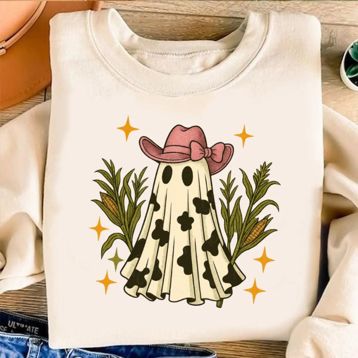 Cowgirl Ghost Halloween Sweatshirt, Cute Western Ghost With Pink Cowboy Hat, Spooky Cornfield Crewneck, Retro Country Halloween Pullover, Trendy Cow Print Ghost Shirt For Women, Unisex Regular Fit Crewneck Tee, Classic Streetwear