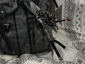 Collapsible Fishing Pole - Carbon Fiber & Titanium Design, Extends to 6' 8", Reel Collapse, Lifetime Warranty for Versatile Storage