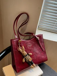 Gentle retro wine red wrinkled texture tote bag with practical and versatile texture, large capacity shoulder bag with detachable rabbit pendant, suitable for daily commuting, shopping in the mall, and attending parties Handbag Shoulder Purse