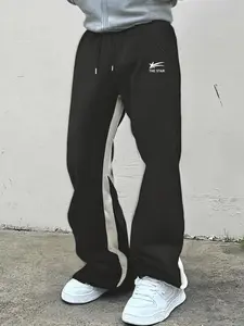 TikTok Trending, Black Loose-Fit Sweatpants, Sportswear, with Light-Colored Stripes Along the Side, Featuring "THE STAR" Logo and Graphic on the Front, Drawstring Closure for Adjustable Fit, Perfect for Casual Trendy Streetwear Look