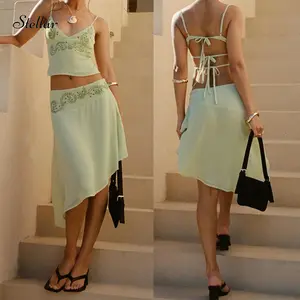 Women's 2 Piece Sexy Skirts Sexy Outfits Floral Print Spaghetti Backless Strap V-Neck Cami Tops Asymmetrical Midi Skirts Clothes Set