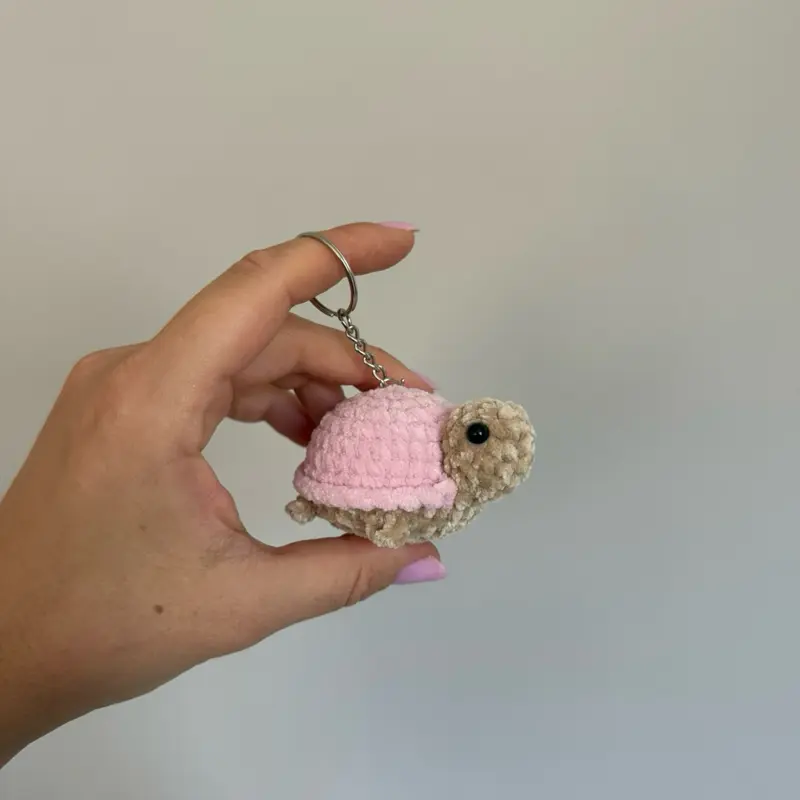 Handmade Crochet Keychain Featuring a Turtle with Pink Shell and Detailed Features for Unique Accessory