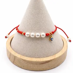 Lucky Protection Bracelet with Pearl Accents and Evil Eye Charm in Red String Design for Women