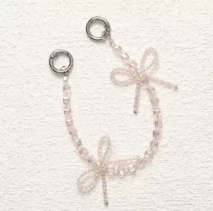 Pink bow mobile phone chain high-end colored diamond short double buckle anti-lost keychain high-end bag pendant