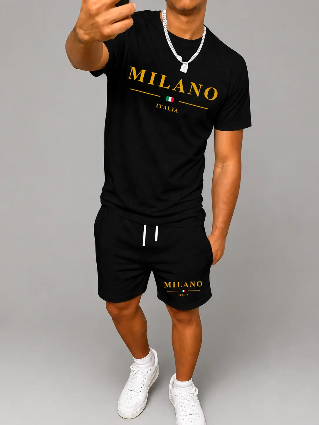 Men’s summer regular-fit cotton short-sleeve T-shirt and cotton shorts set featuring a gold Milan letter print. Fashionable casual menswear for going out: pocketed athletic elastic-waist drawstring shorts. Two-piece set suitable for running, golf, fishing