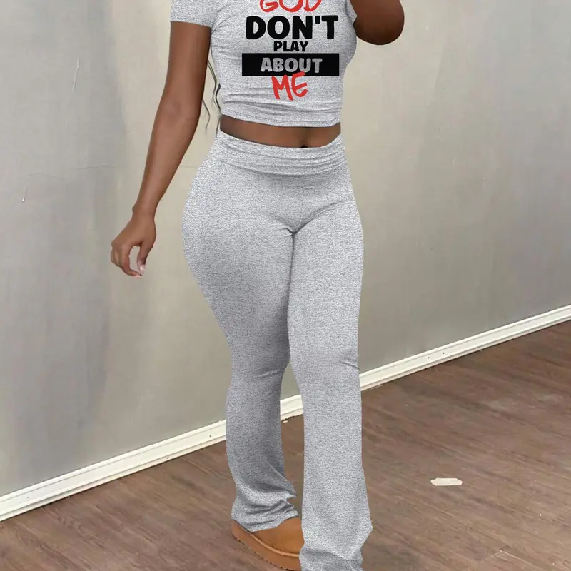 Women's Letter Print Statement Crop Tee & Flare Leg Pants Two-piece Cropped Top Set, Casual Fashion Vibe Cozy Round Neck Short Sleeve Top & Bell Bottom Trousers for Daily Outdoor Wear, Ladies Clothes for Spring & Fall
