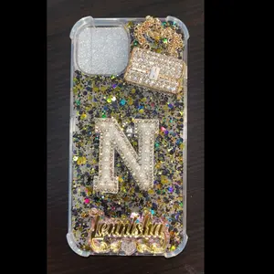 iPhone 15 Black and Gold Case with Sparkly Design and Letter "N"