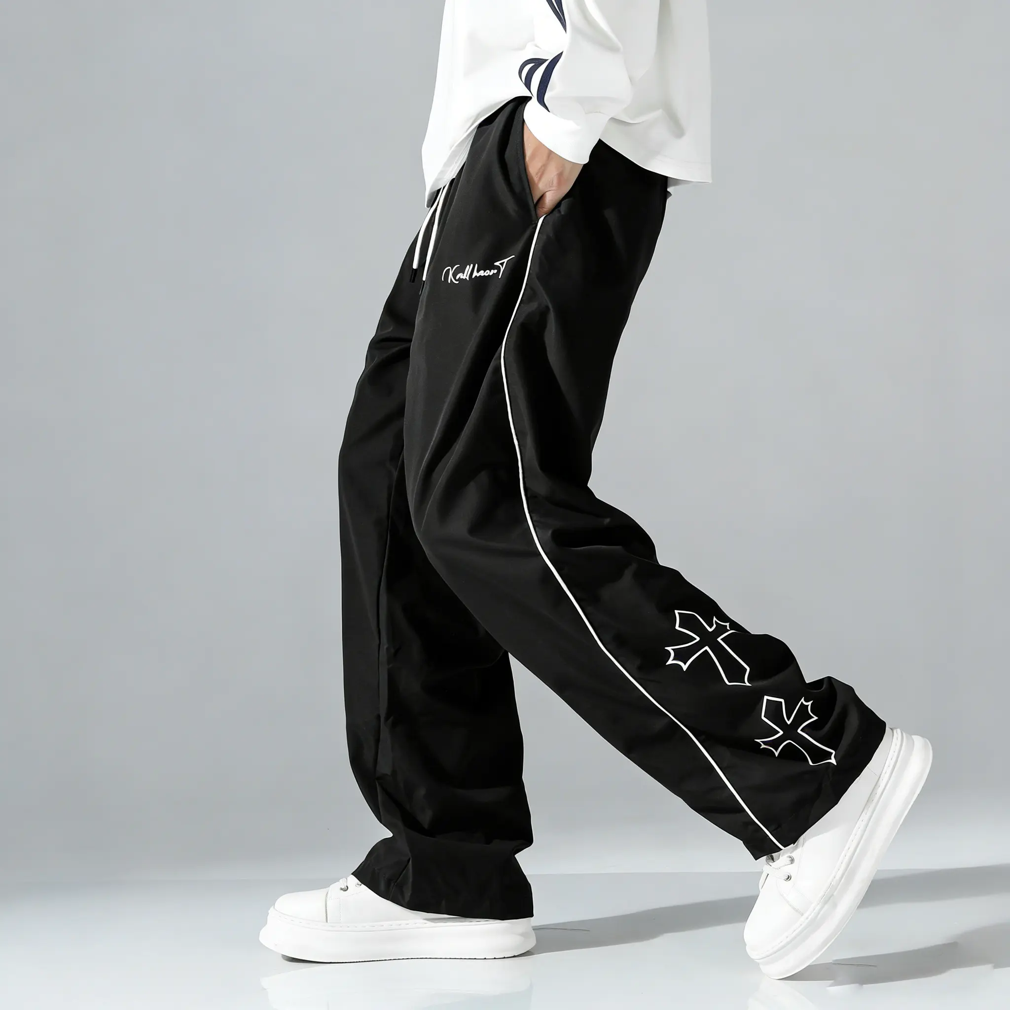 Men’s wide-leg pants Athletic drawstring elastic waistband, made from polyester fabric—comfortable and breathable, loose with a drapey feel that resists wrinkles. Suitable for street style, everyday casual wear, and outdoor outfits. Trouser Stylish