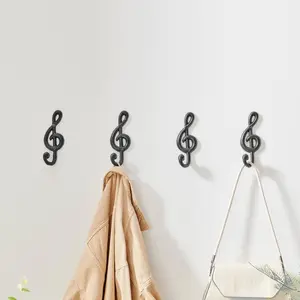 4 Piece Dark Brown Cast Iron Musical Note Treble Clef Decorative Wall Sculpture Figure Utility Hook Set