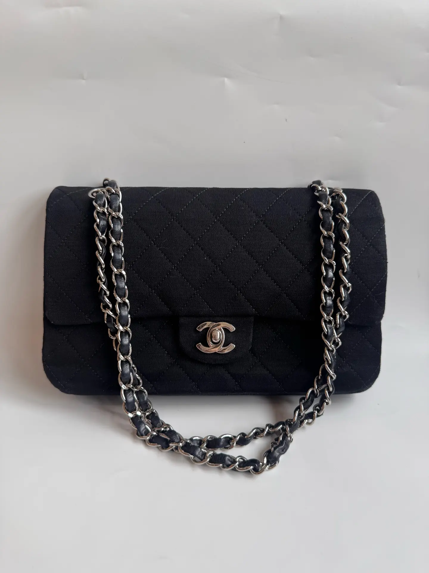 Pre-owned CHANEL Classic Flap Medium Shoulder & Crossbody Bag in Black Fabric with Silver Hardware, Vintage 2014 Edition.