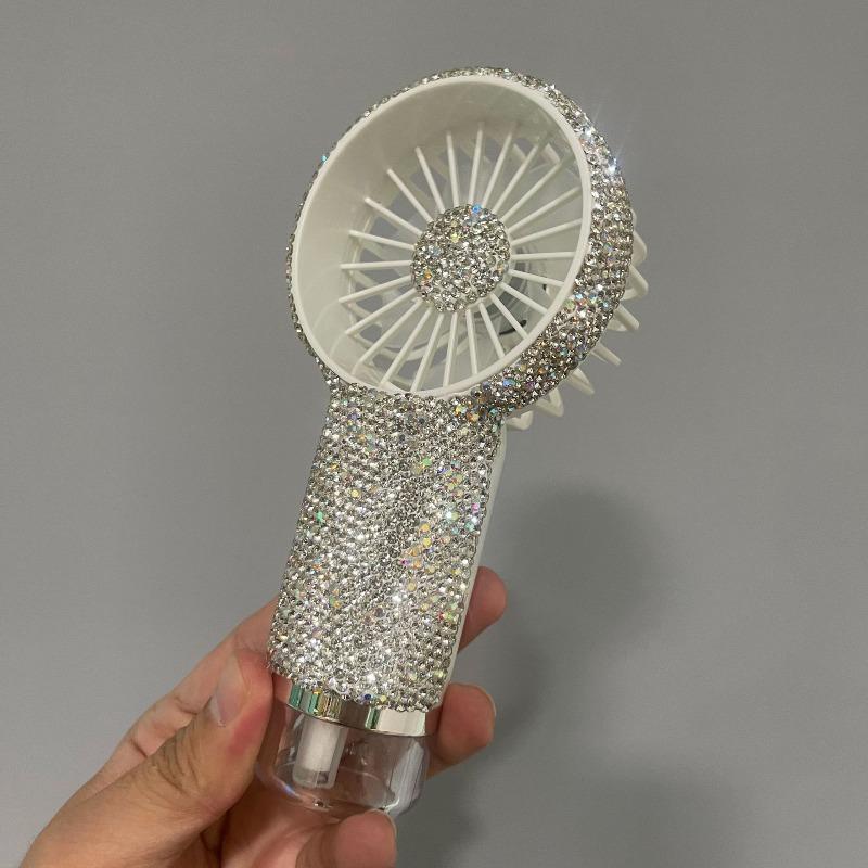 Rechargeable Mini Spray Fan—a portable, diamond-shaped handheld fan featuring long-lasting battery life. Ideal for weddings, outdoor activities, office desktops, and travel; it also makes a delightful gift for Valentine's Day and Mother's Day.