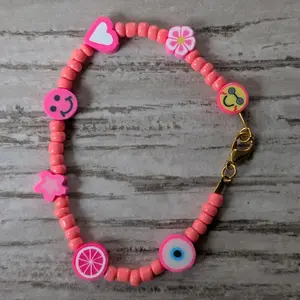 Super cute Y2K hot pink seed bead bracelet with fun clay beads pink seed bead bracelets seed bead jewelry