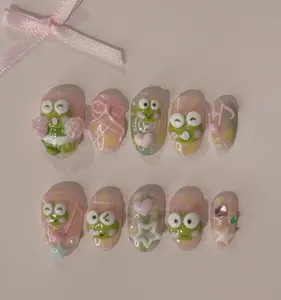 Keroppi Dream nails – cute pastel pink base with 3D green frogs, hearts, bows, and stars creating a playful, bubbly, and irresistibly kawaii aesthetic