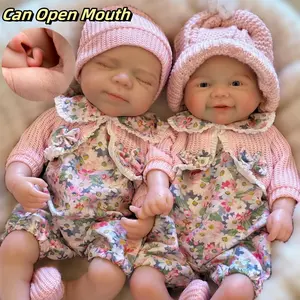 Otarddolls 1PC 13 Inch Open Mouth Full Body Silicone Reborn Girl Doll With Pink Outfits Lifelike Artificial Painted Skin Clear Veins Bald Can Have A Bath Newborn Doll Toys